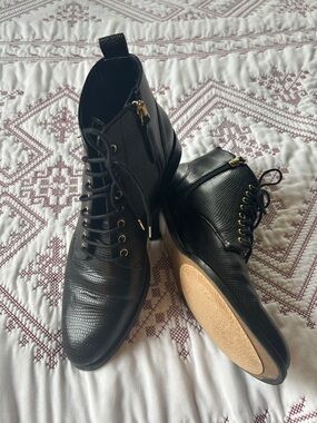 Bocage Women’s Black Lace-Up Ankle Booties with Side Zip and Gold Hardware